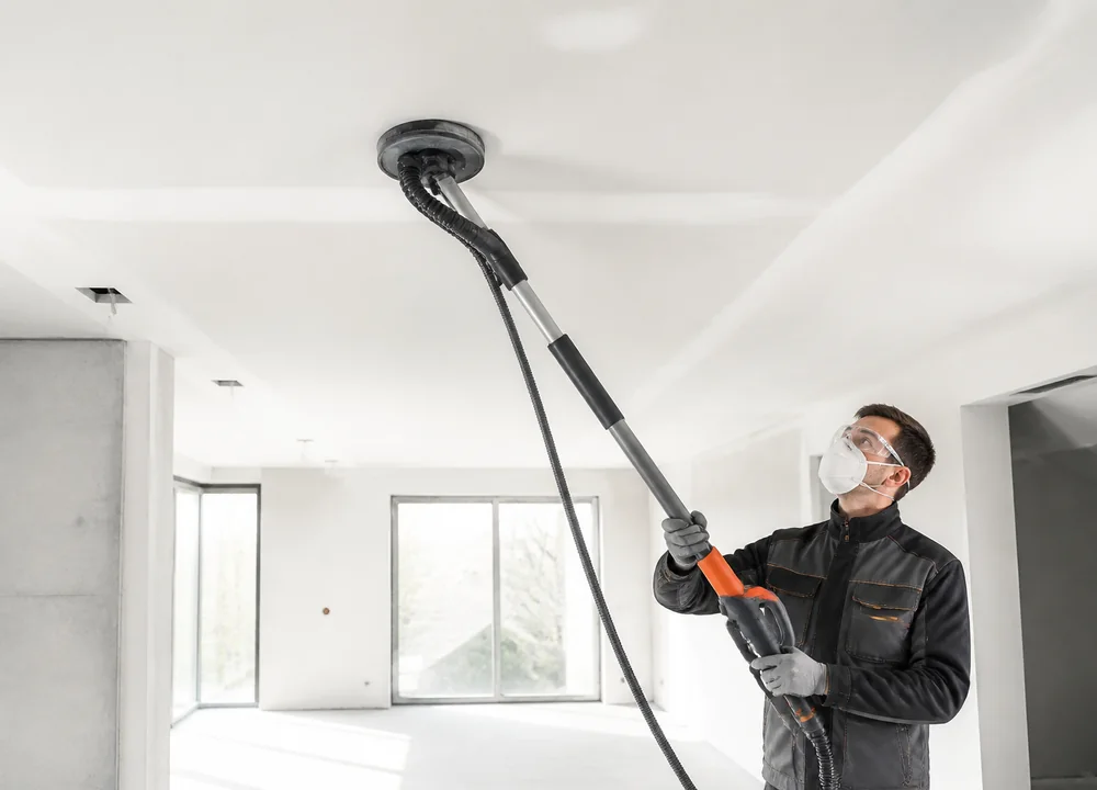 Ponceuse girafe utilisée au plafond